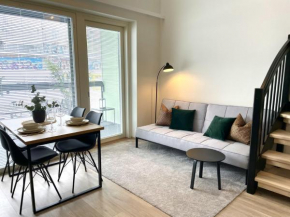 Bright loft apartment with glazed balcony